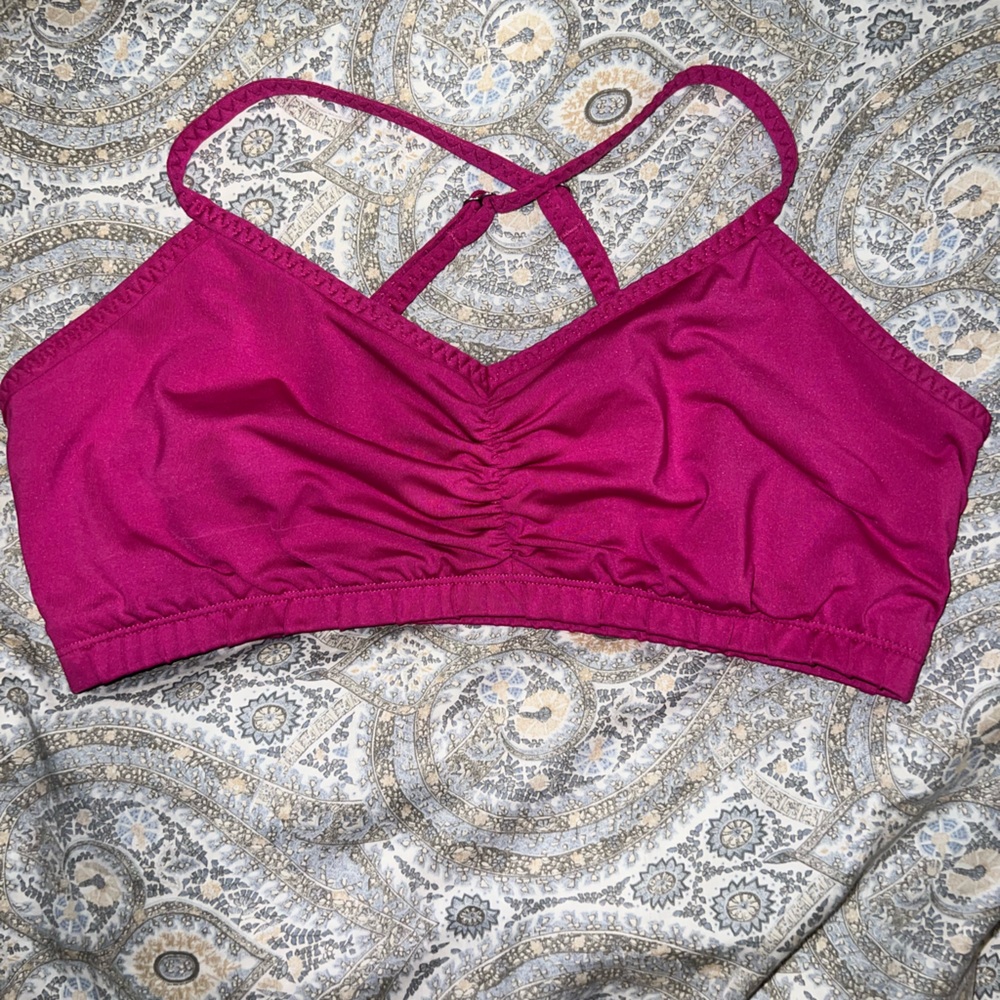 Handful sports bra in magenta, adjustable criss-cross straps